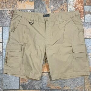 MidwayUSA tan 50” Cargo Shorts.